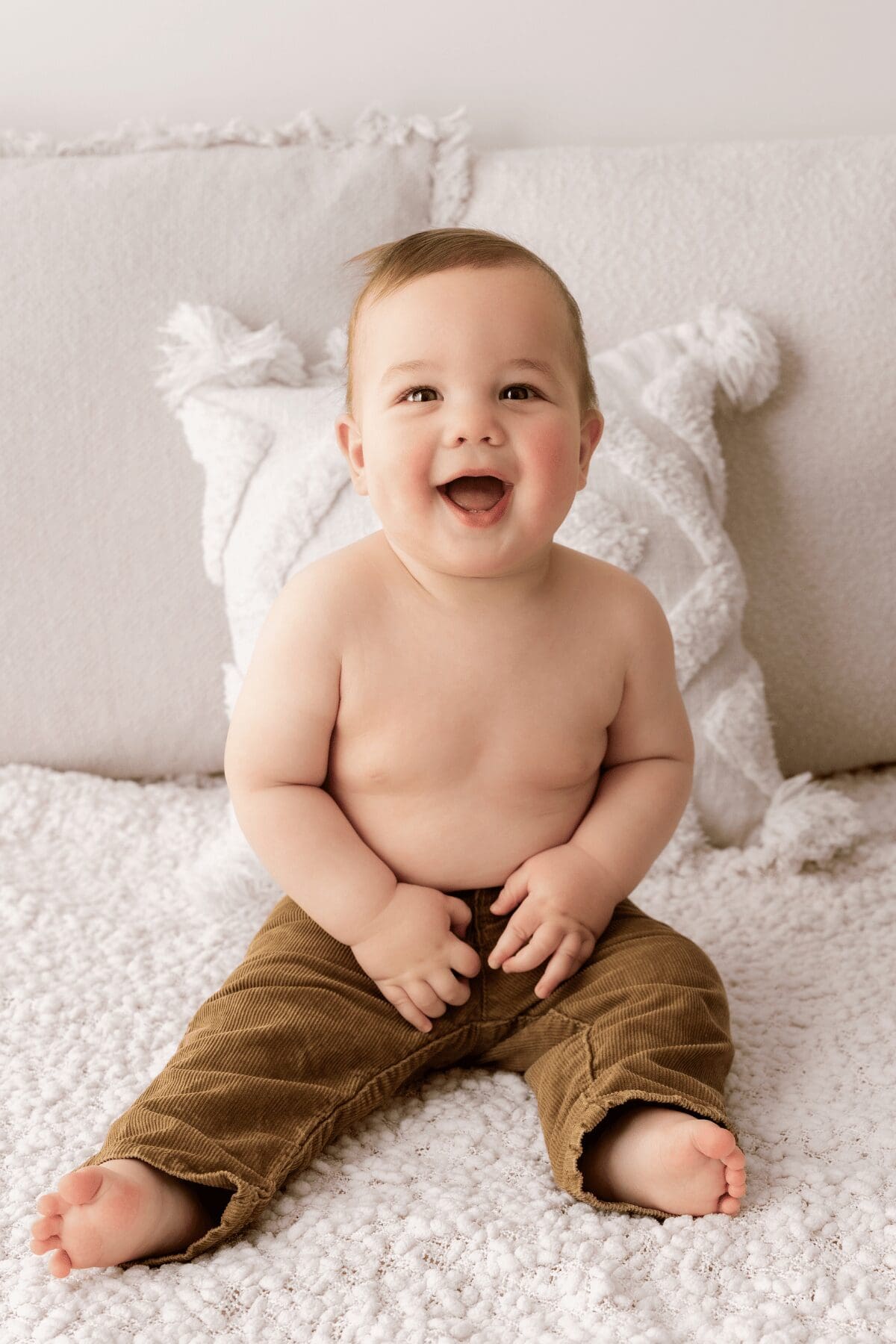 Baby sitting independently during a milestone photography session in Hilbert Perth
